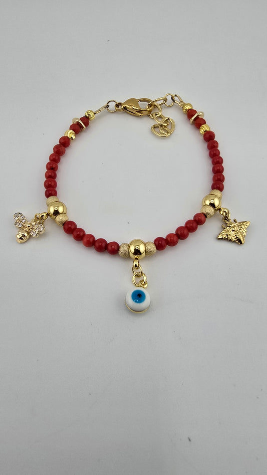 Bracelet en corail rouge avec charms