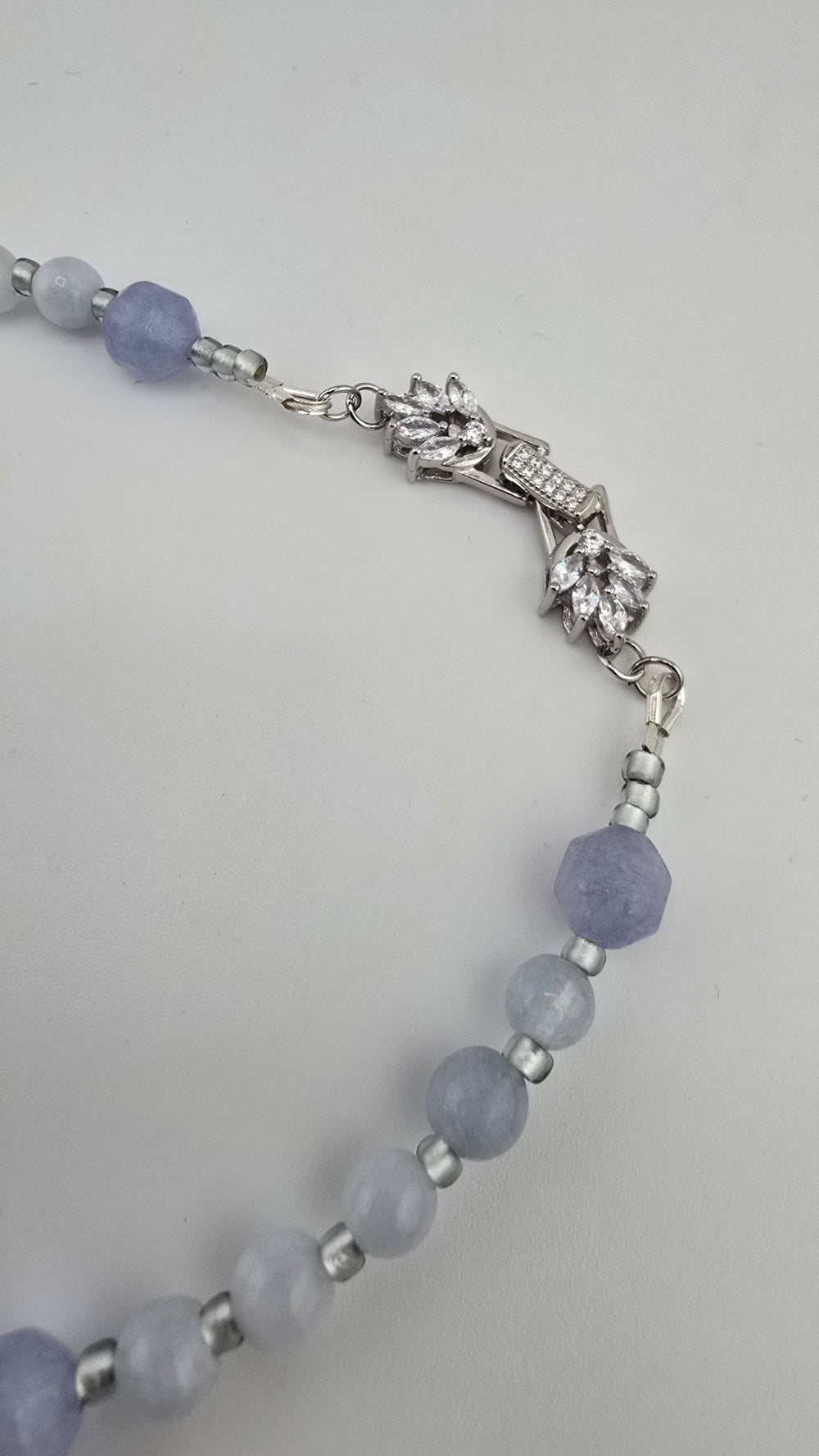 Collier en Aigue Marine et fermoir couture