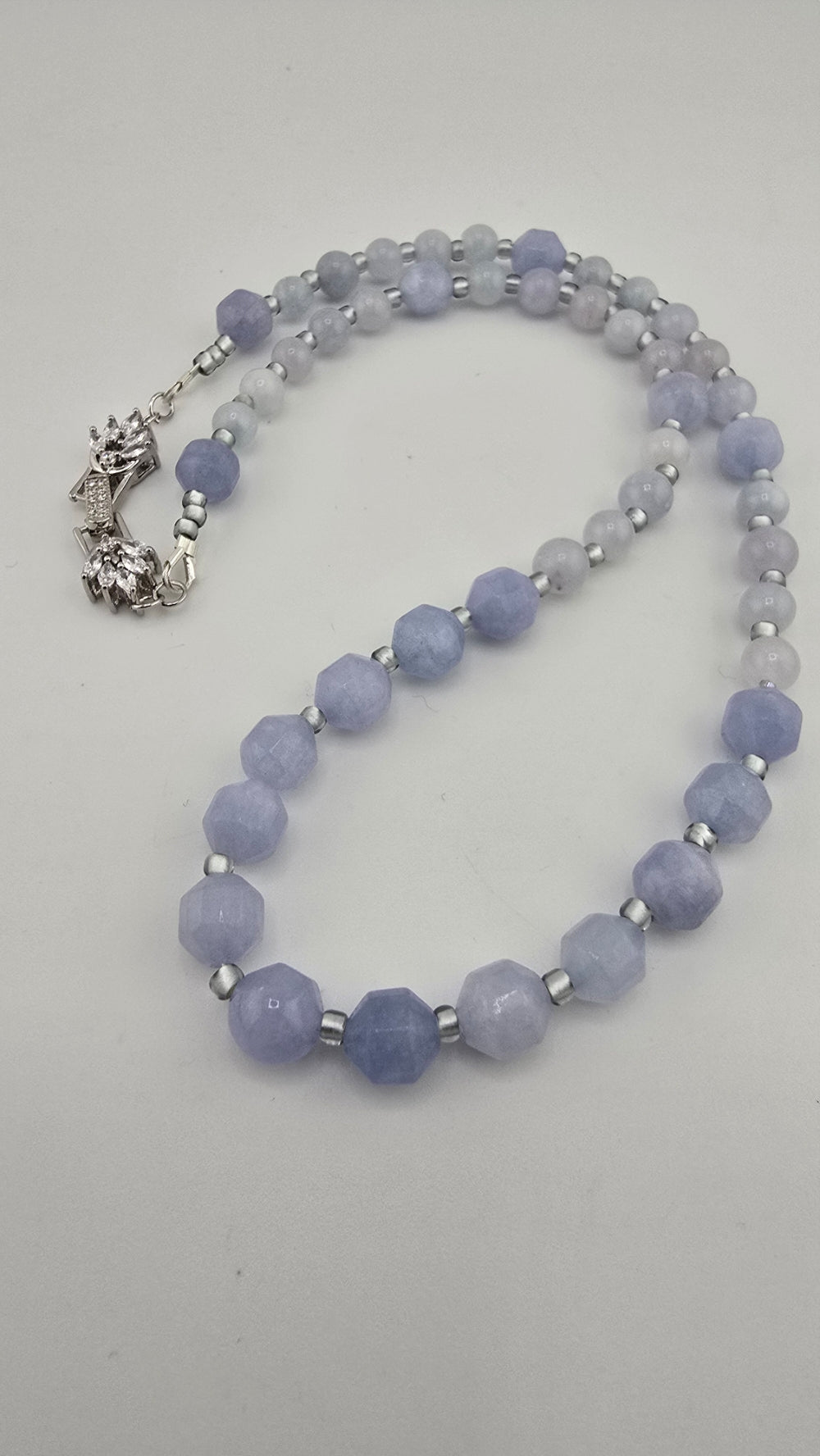 Collier en Aigue Marine et fermoir couture