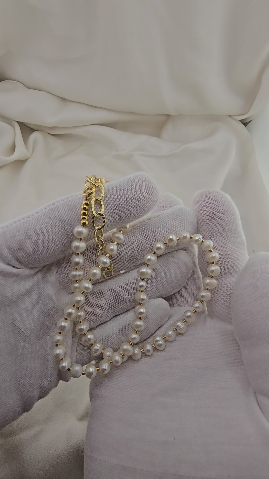 cultured pearl necklace in its case