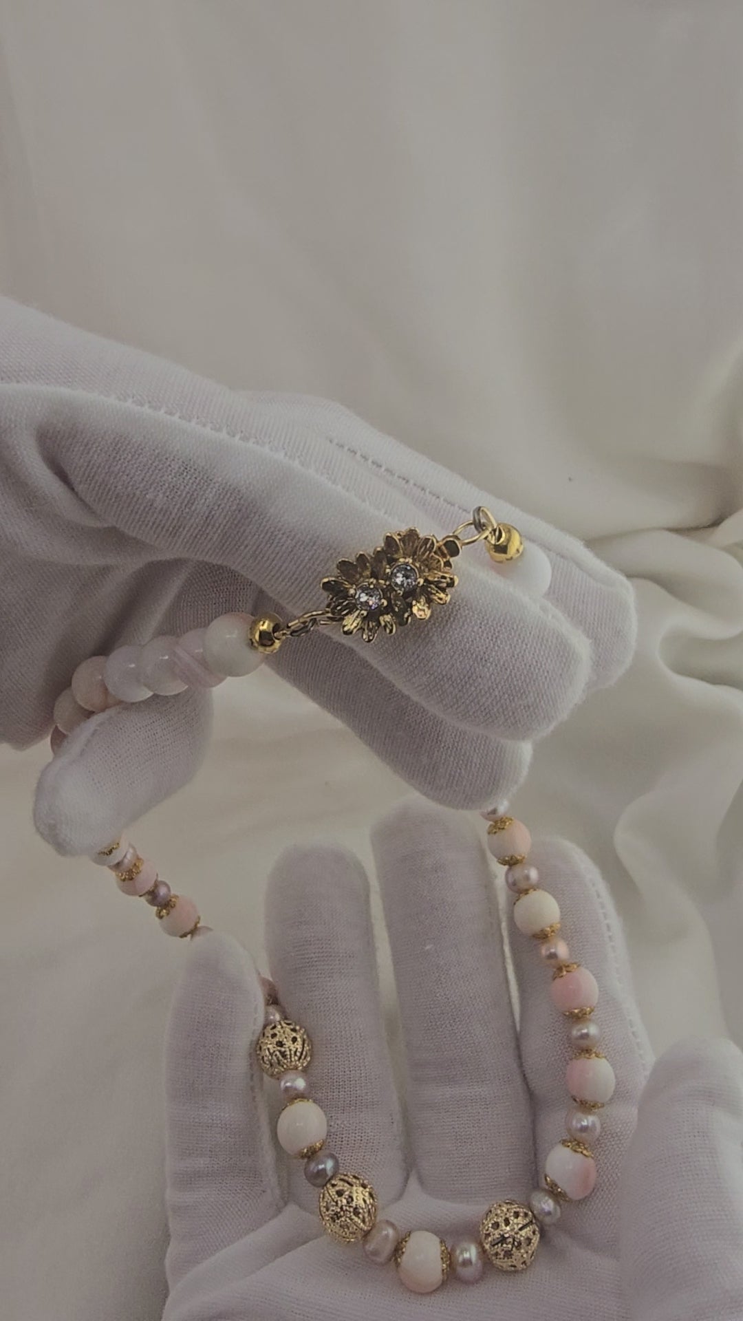Collier en perles de culture et perles de Lambi