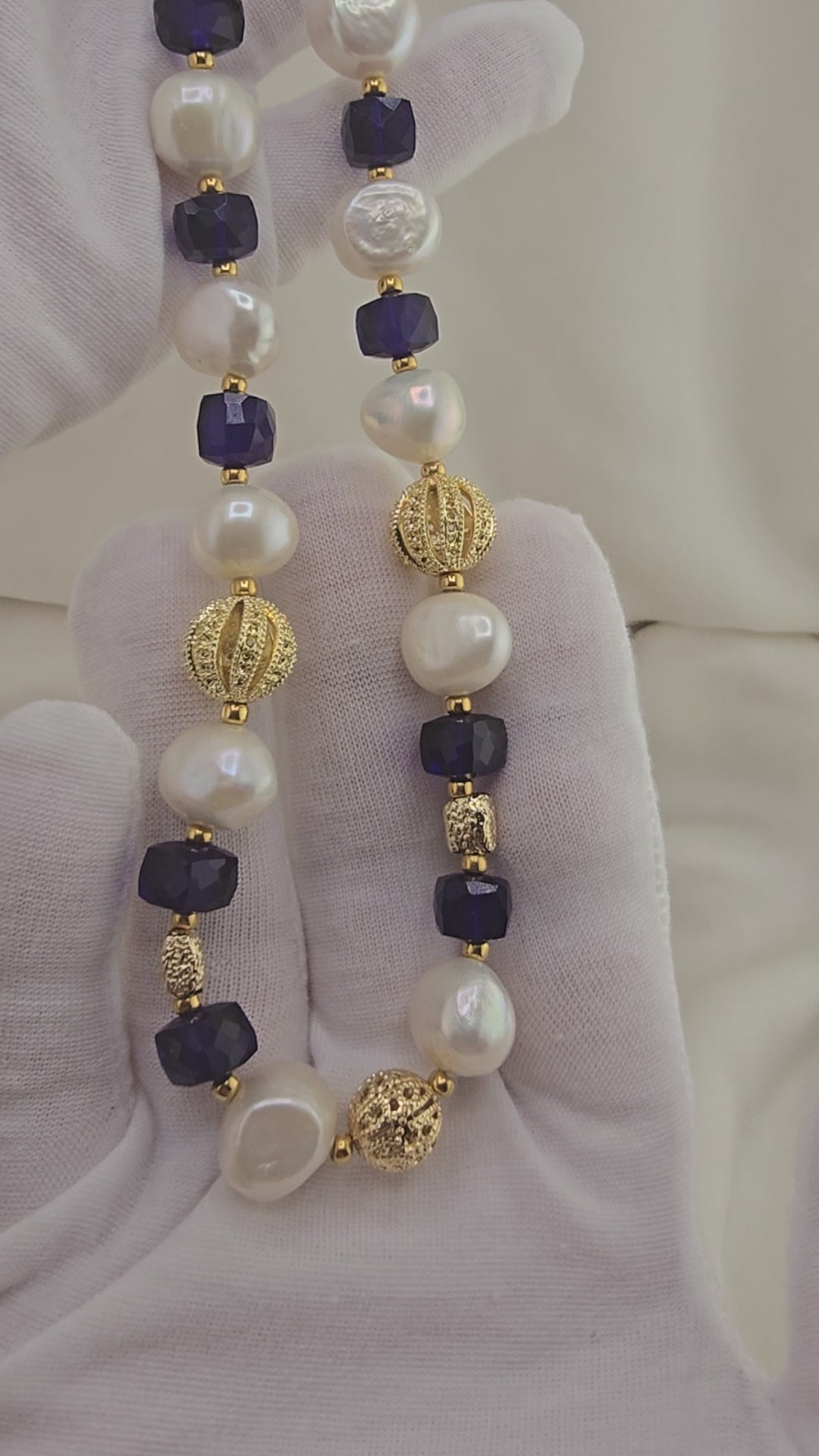 Baroque cultured pearl necklace, blue quartz in its case