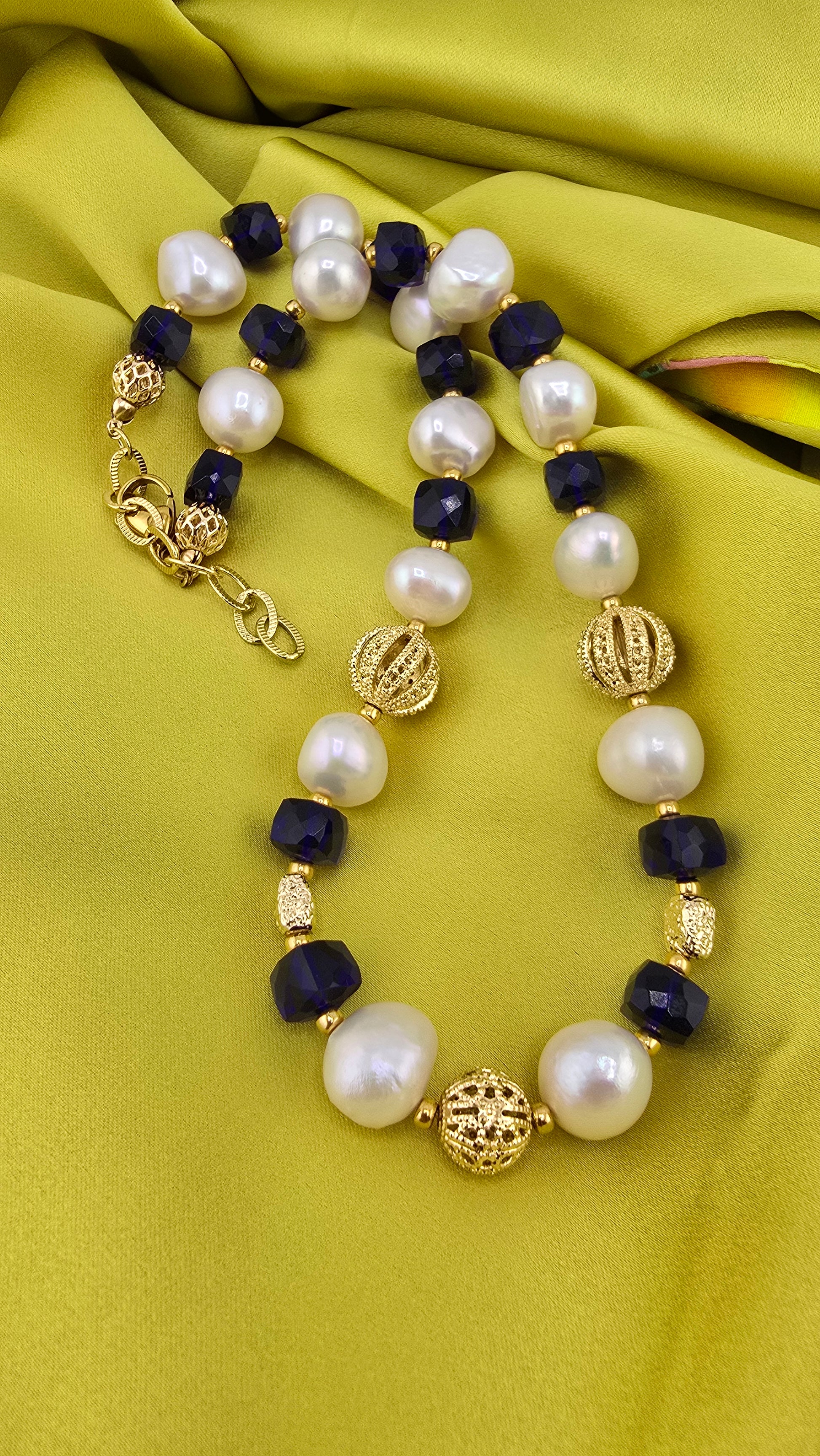 Baroque cultured pearl necklace, blue quartz in its case