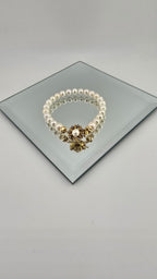 Bracelet en perles de culture et fermoir couture