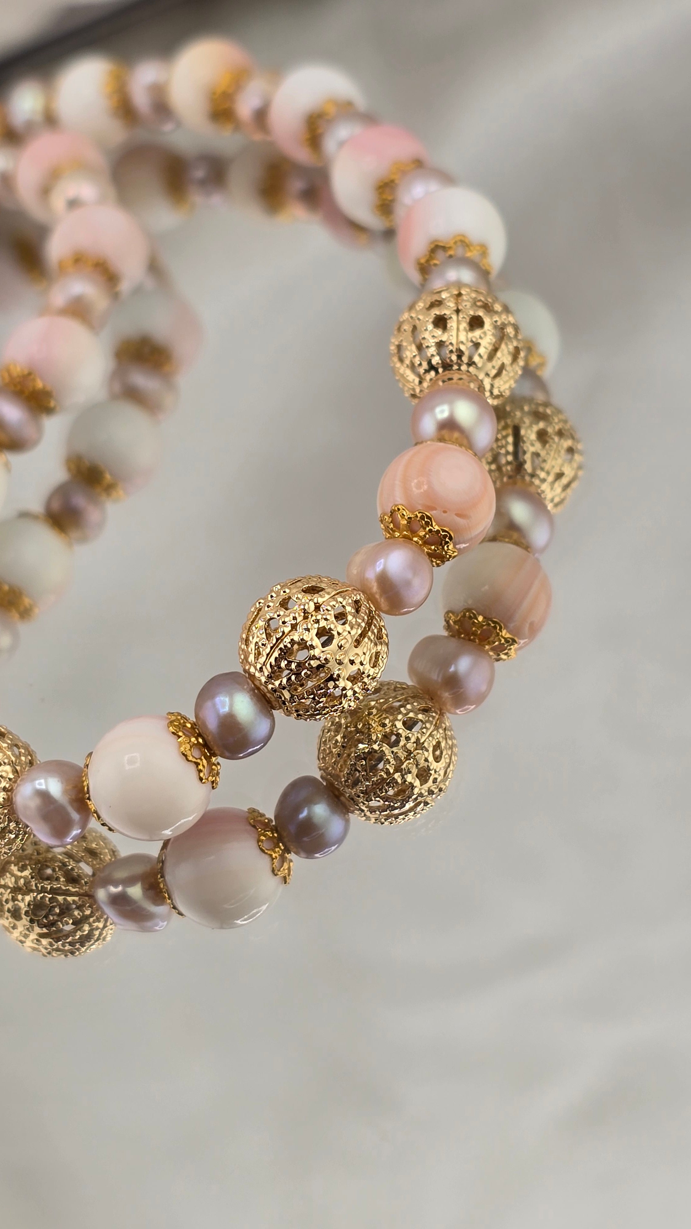 Collier en perles de culture et perles de Lambi