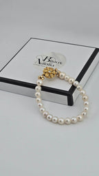 Bracelet perles de culture et fermoir couture