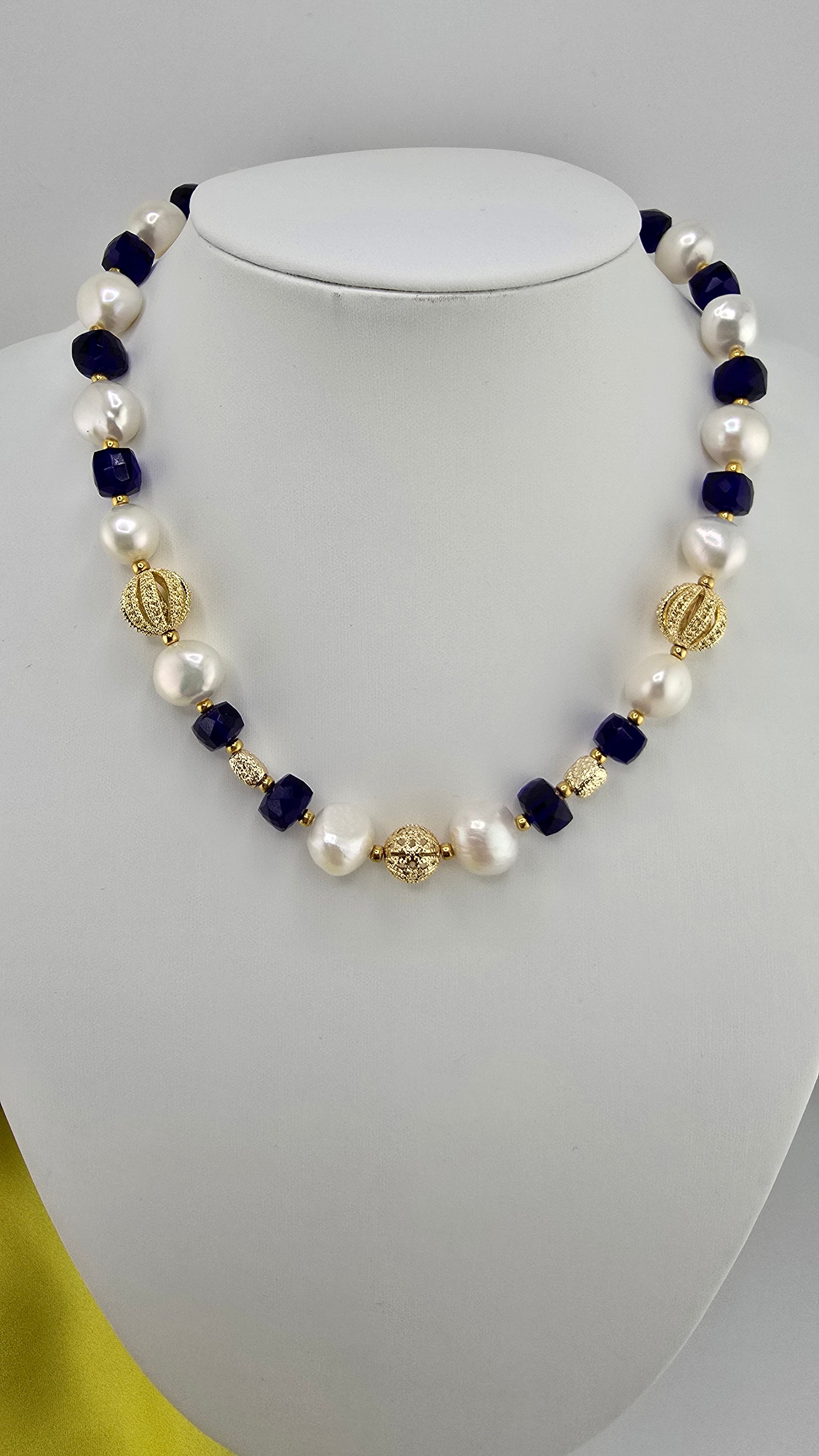 Baroque cultured pearl necklace, blue quartz in its case