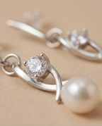 Boucles d oreilles en perles de culture blanche et olive
