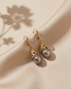 Boucles d'oreilles avec perles de culture baroque