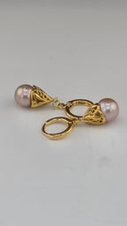 Boucles d'oreilles en perles de culture luisantes