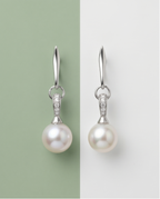 Rhinestone and cultured pearl earrings