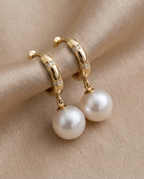 Boucles d’oreilles dormeuses avec perles de culture