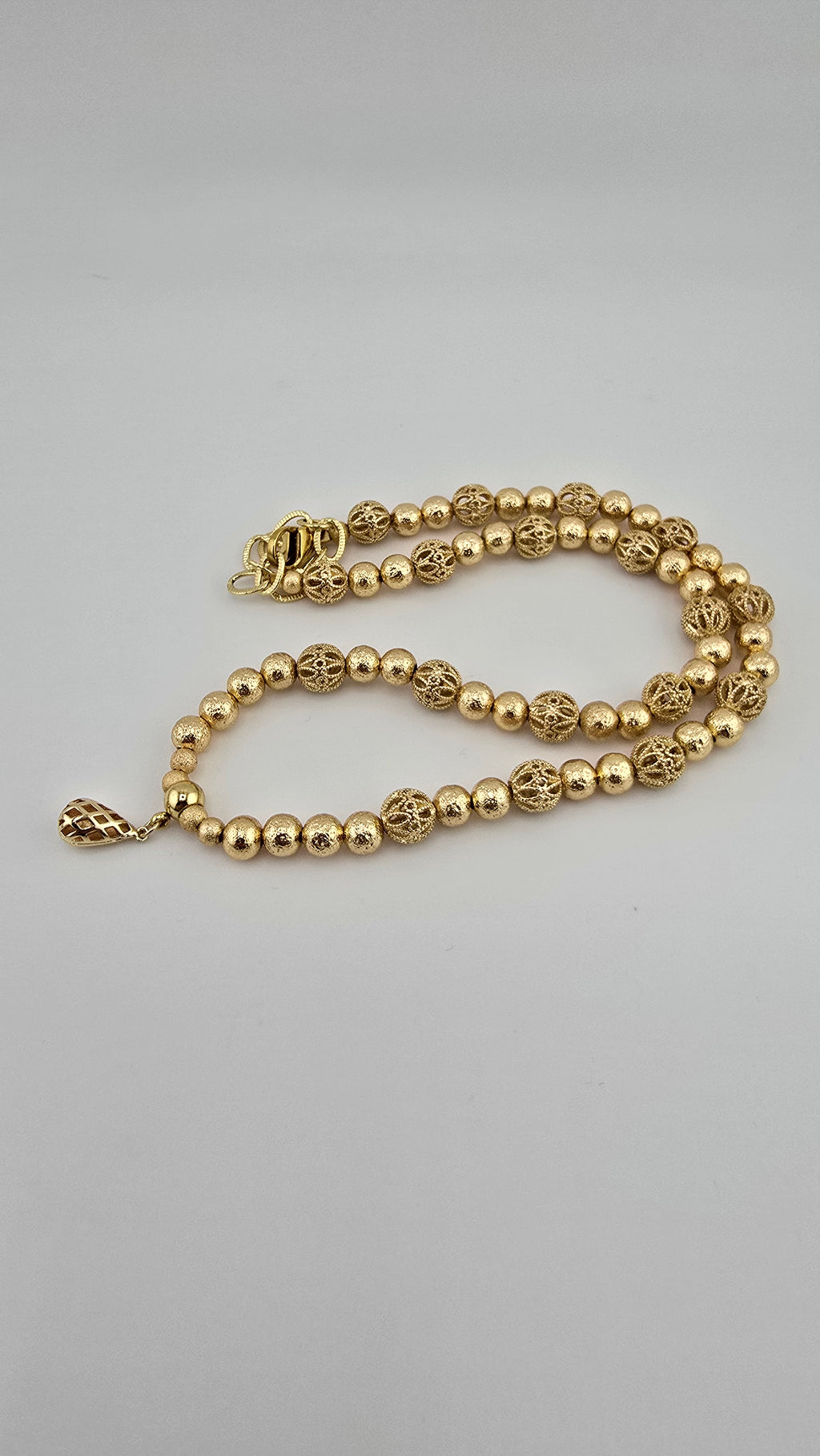 Collier en plaqué or et son pendentif