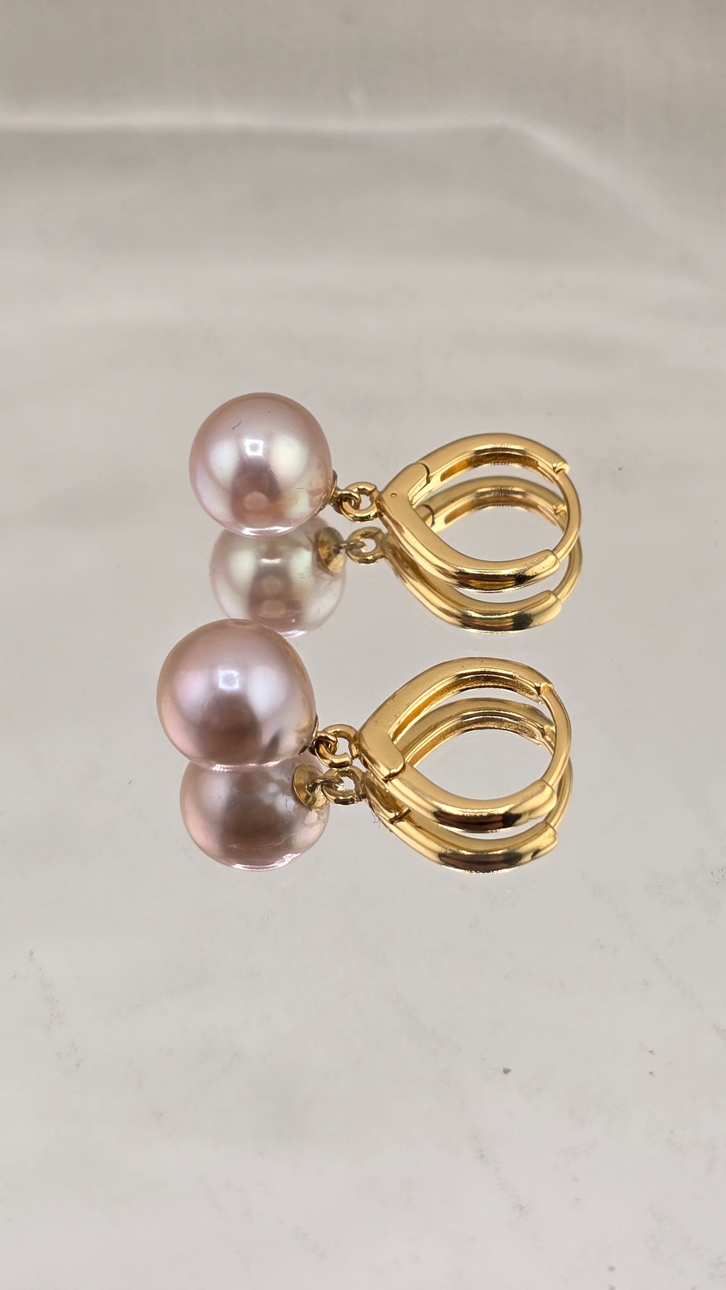Boucles d’oreilles avec perles de culture rose