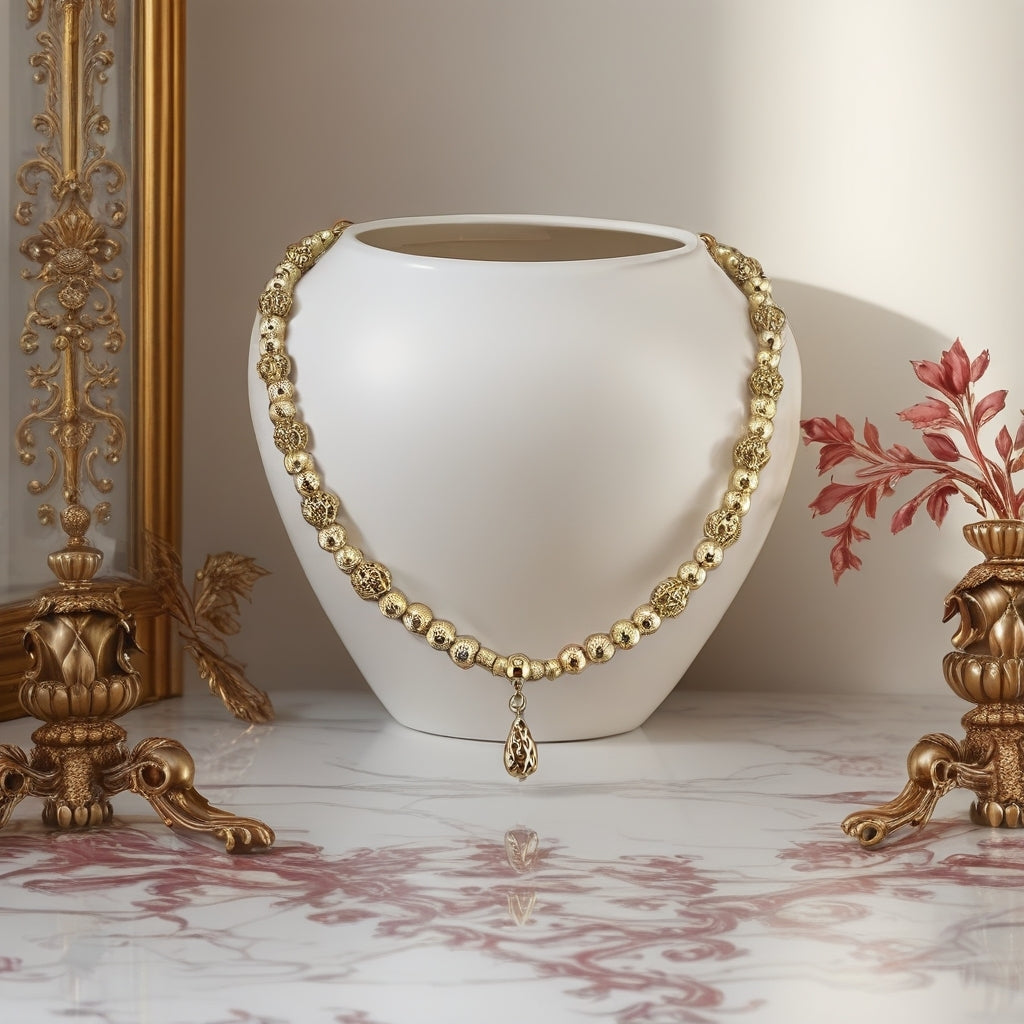 Collier en plaqué or et son pendentif