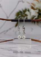 Boucles d oreilles en perles de culture blanche et olive