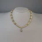 Collier en plaqué or et son pendentif