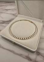 Collier ras du cou en perles de culture dans son écrin