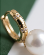 Boucles d’oreilles dormeuses avec perles de culture