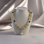 Collier avec pendentif en vermeil et perle de culture blanche luisante