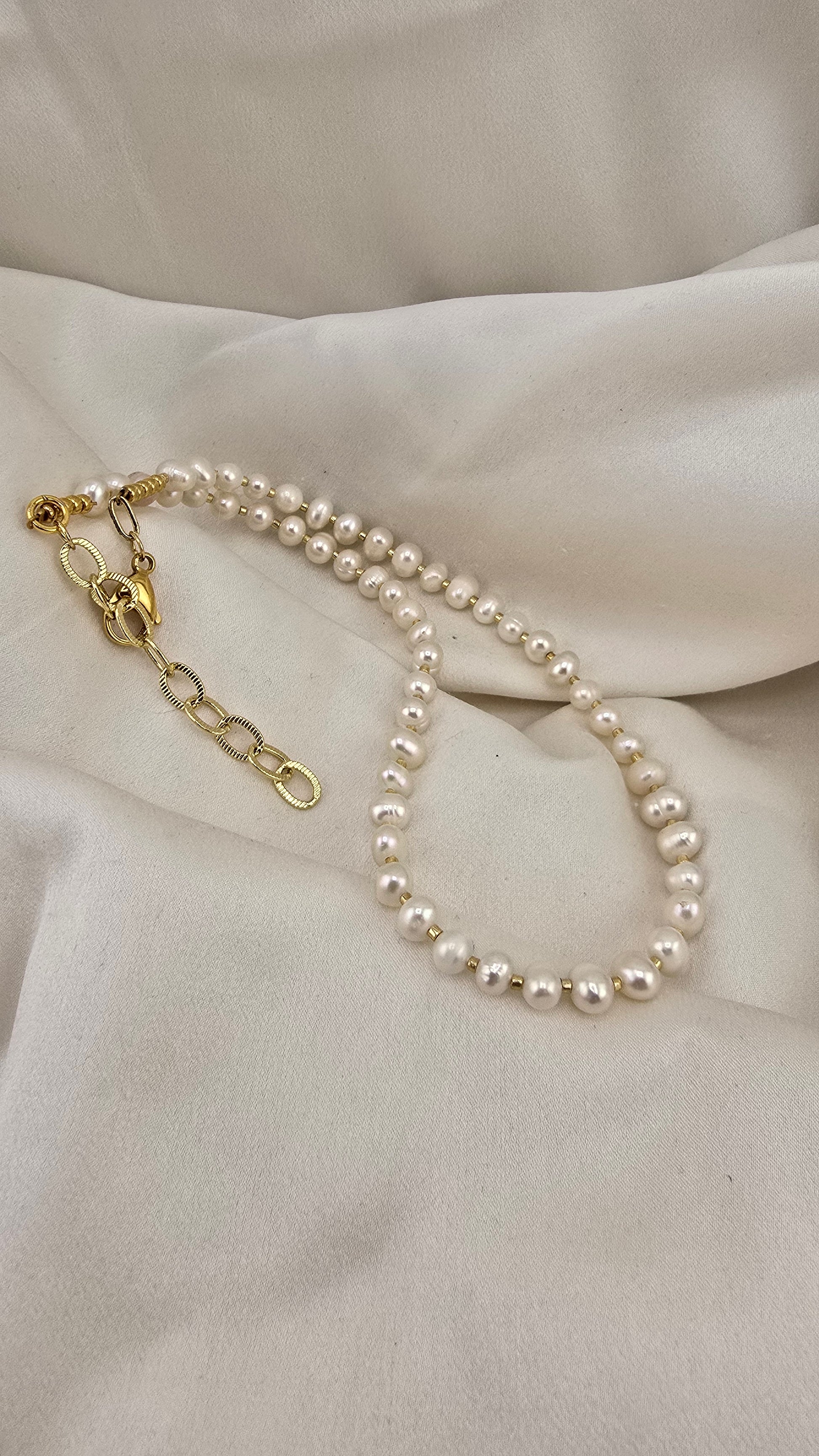collier de perles de culture dans son écrin