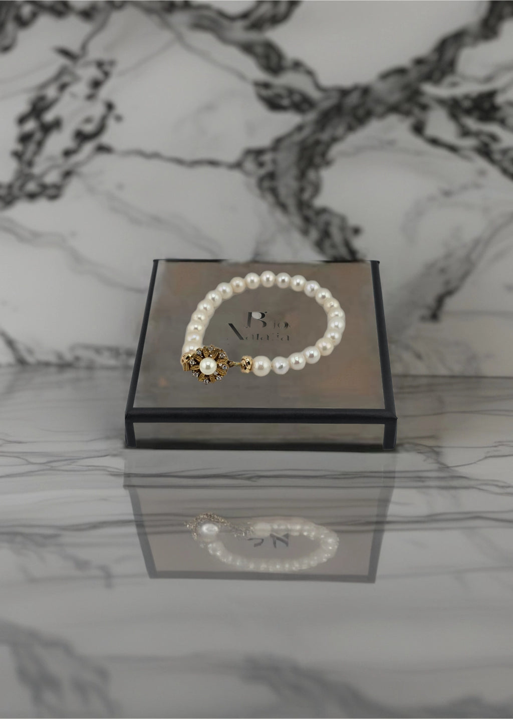 Bracelet en perles de culture et fermoir couture