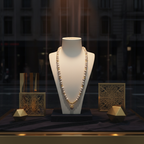 Collier en perles de culture grise et son pendentif baroque