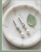 White and olive cultured pearl earrings
