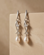 Boucles d oreilles en perles de culture blanche et olive