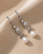 Boucles d oreilles en perles de culture blanche et olive