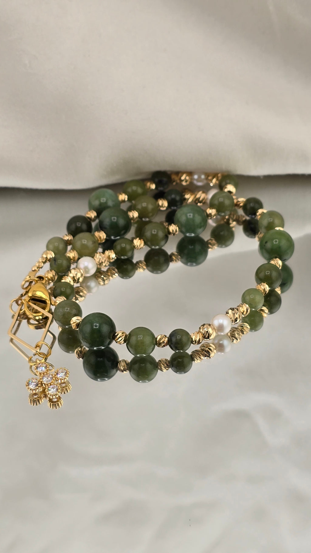 Collier en Perles de culture et Jade.