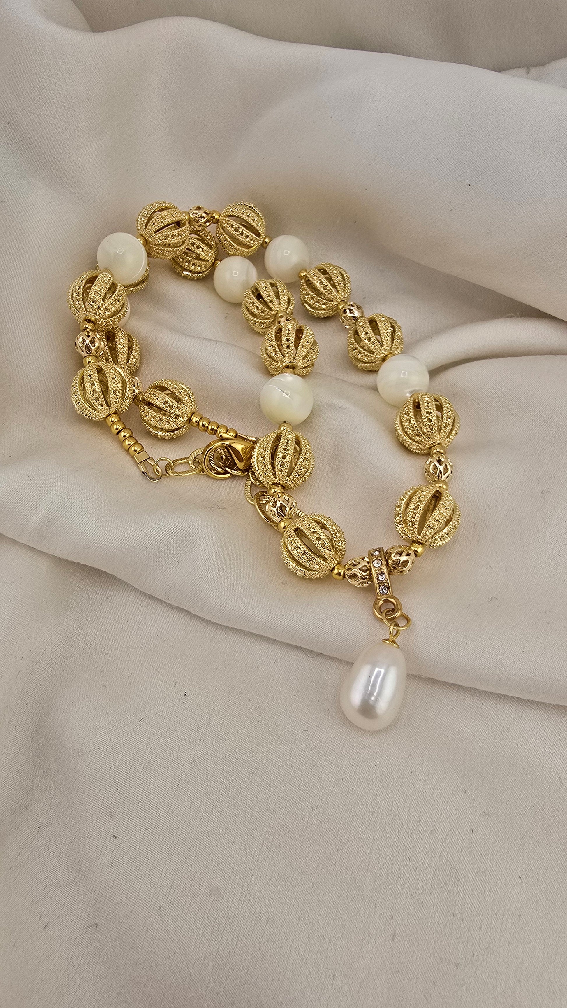 Collier en Nacre et pendentif en perle de culture