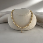 Collier en plaqué or et son pendentif