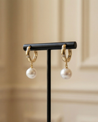 Boucles d’oreilles dormeuses avec perles de culture