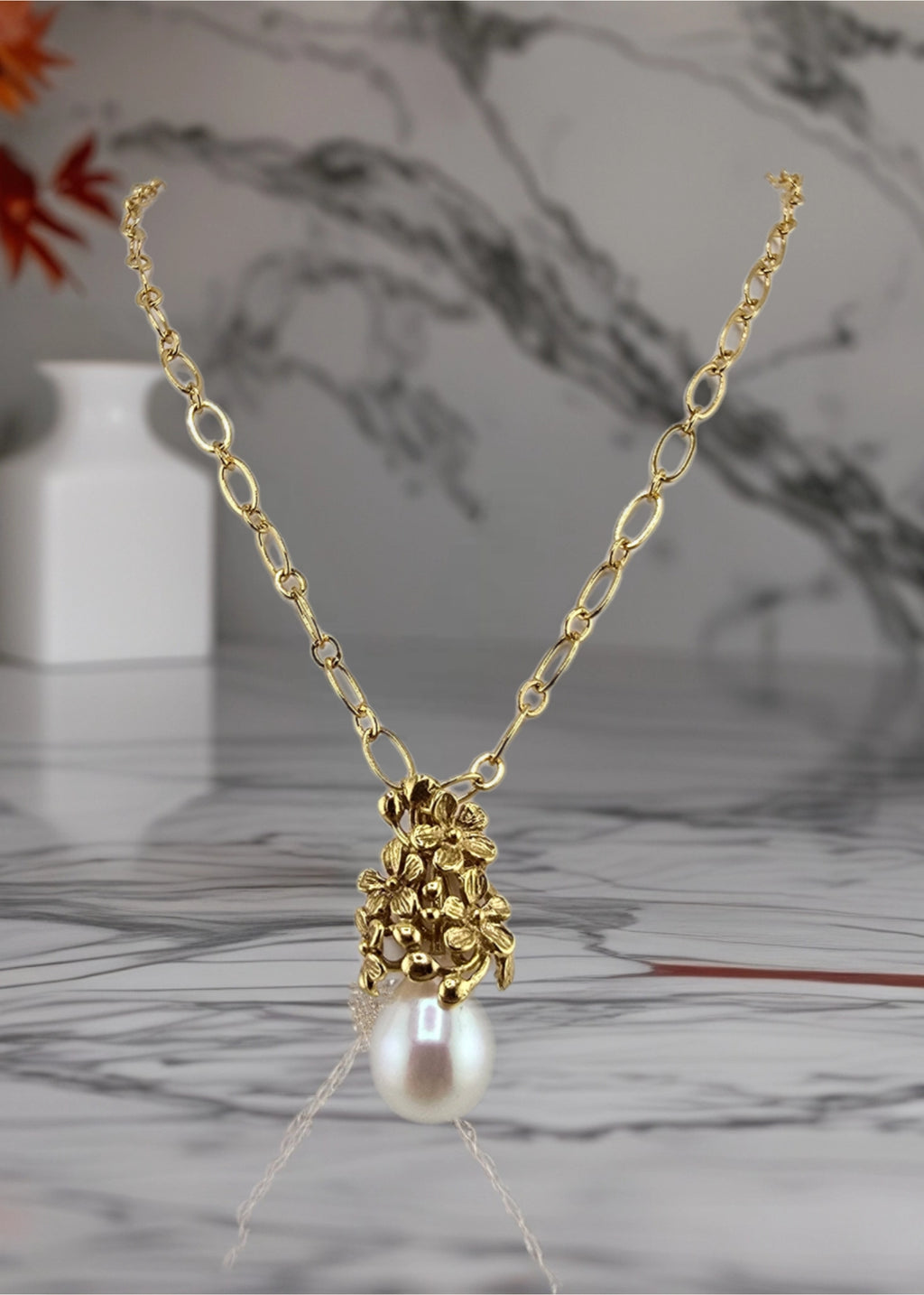 Collier chaine avec pendentif vermeil et perle de culture.