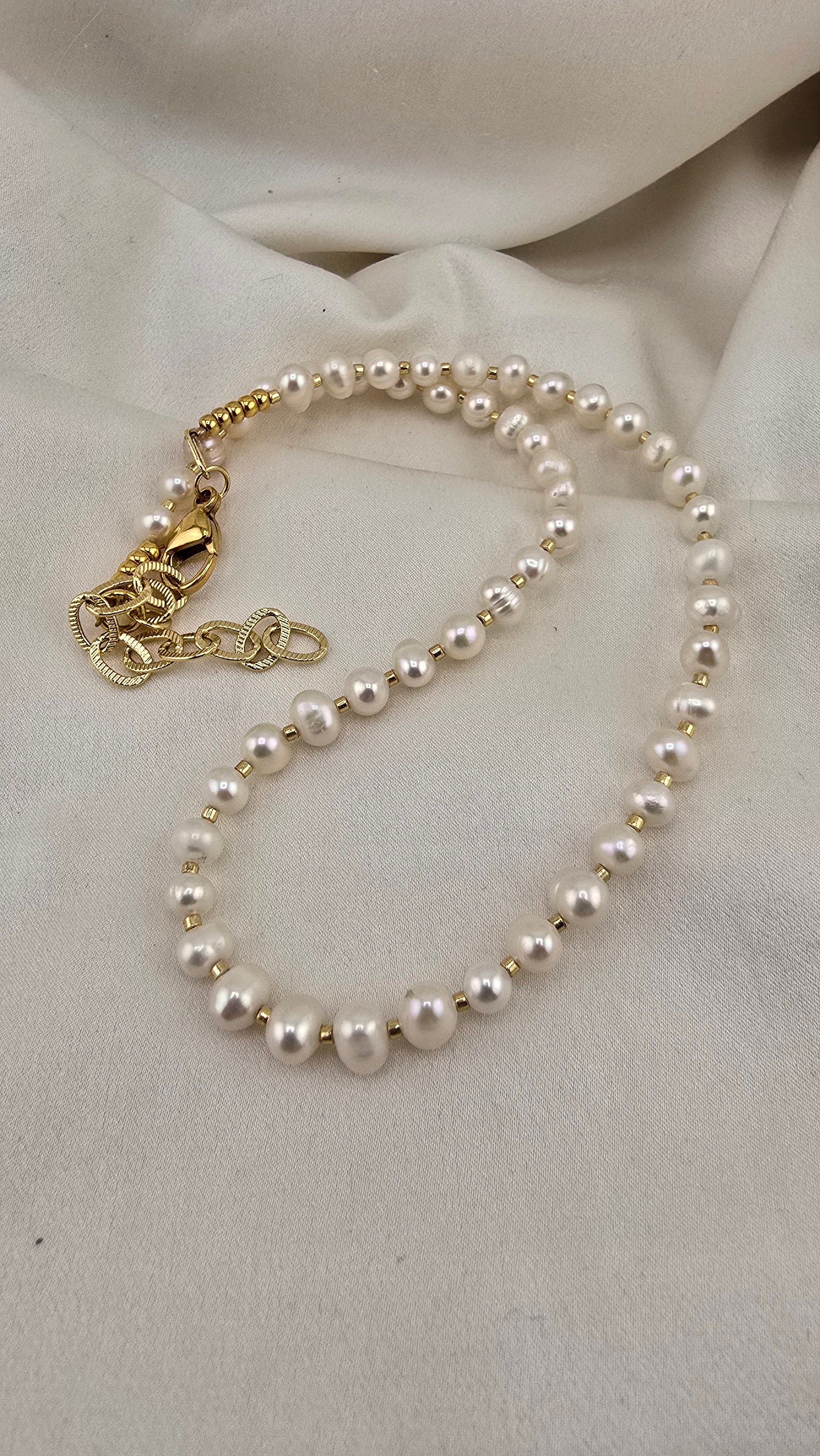 collier de perles de culture dans son écrin