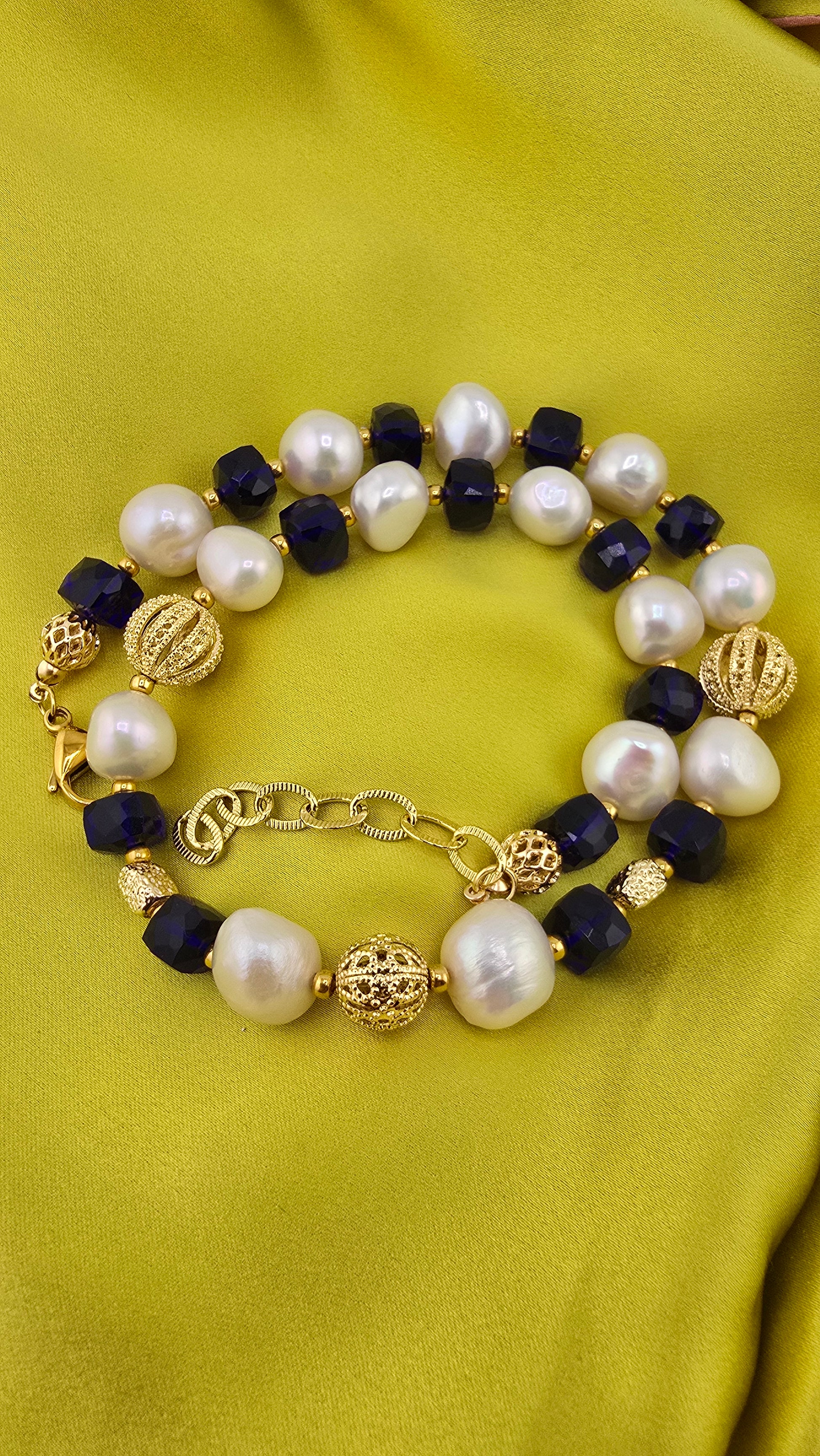 Baroque cultured pearl necklace, blue quartz in its case