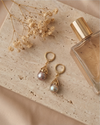 Boucles d'oreilles avec perles de culture baroque