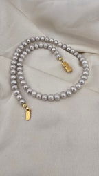 Collier ras du cou en perles de culture grises