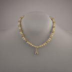 Collier en plaqué or et son pendentif