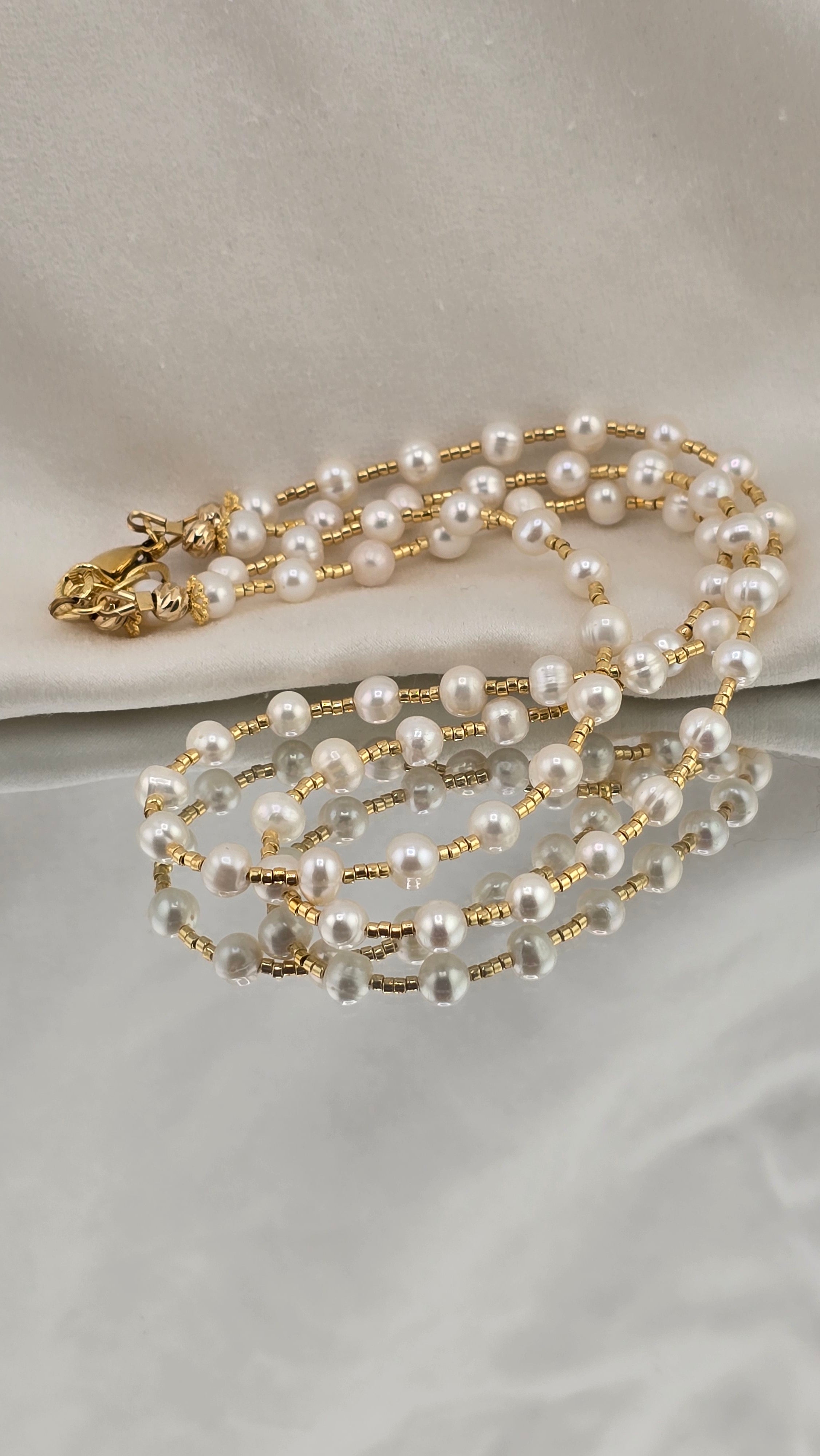 Collier deux rangs de perles de culture