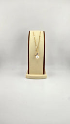 Perle de culture blanche et oiseau en nacre