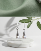 Silver and cultured pearl earrings