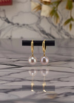 Boucles d’oreilles avec perles de culture rose