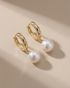 Boucles d’oreilles dormeuses avec perles de culture