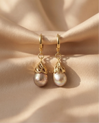 Boucles d'oreilles avec perles de culture baroque