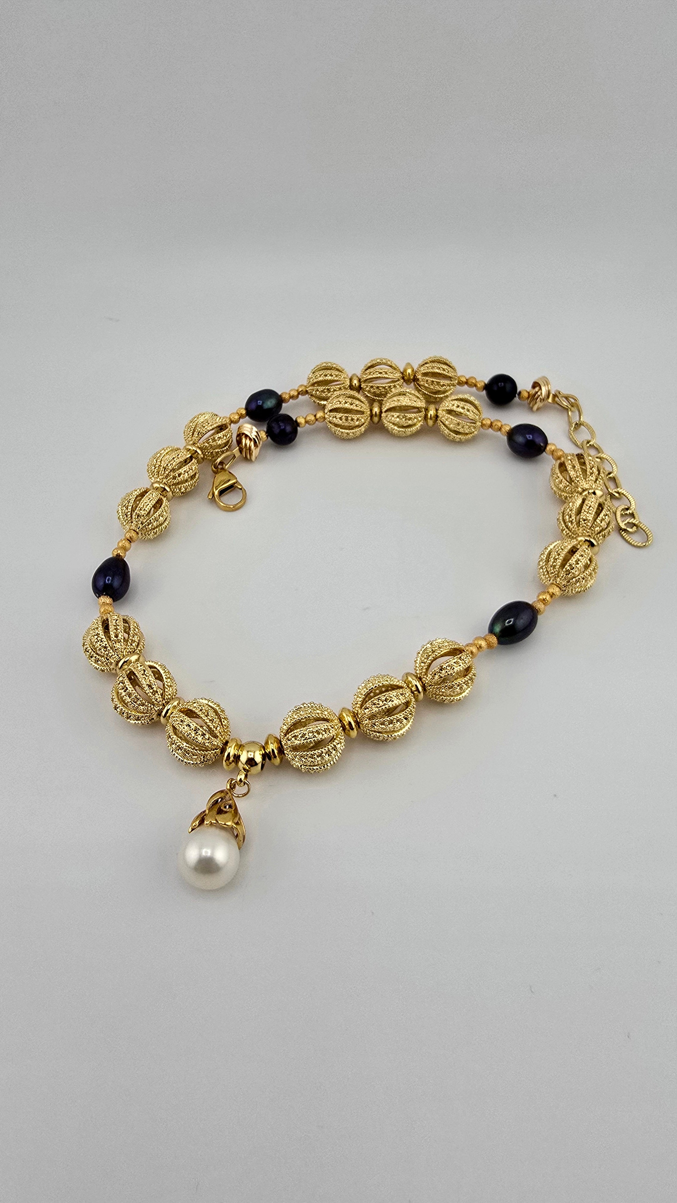 Collier avec pendentif en vermeil et perle de culture blanche luisante