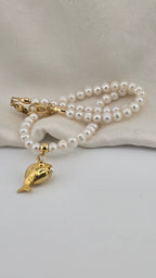 Collier en perles de culture et pendentif poisson