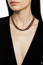 Collier en grès rouge scintillant